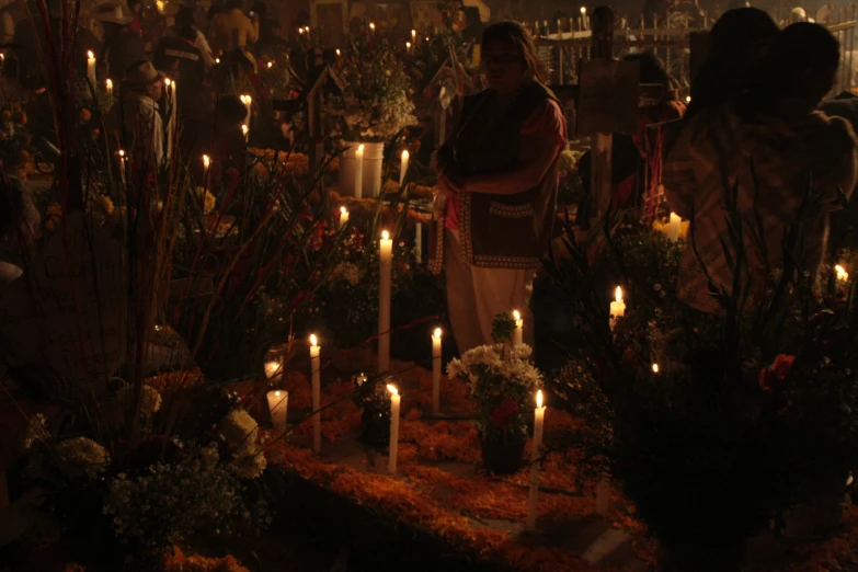 an altar full of candles during a religious gathering