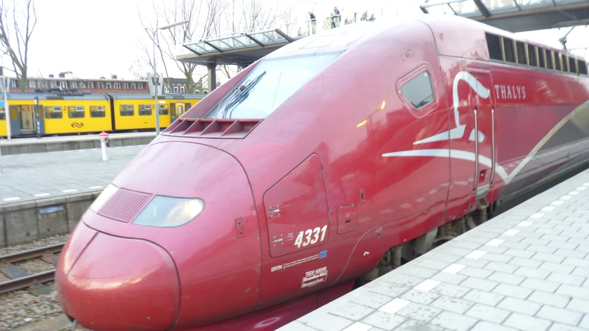 a train is pulled up to the platform