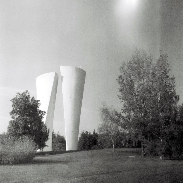 the exterior of a tall building in black and white