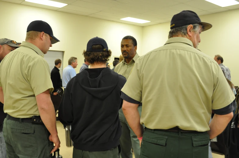 a group of people that are standing around