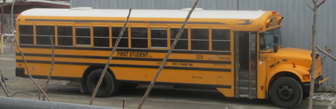 a school bus parked outside of a building