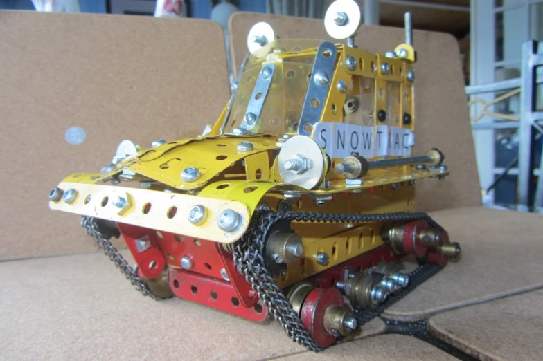 a mechanical robot is shown with a name tag attached