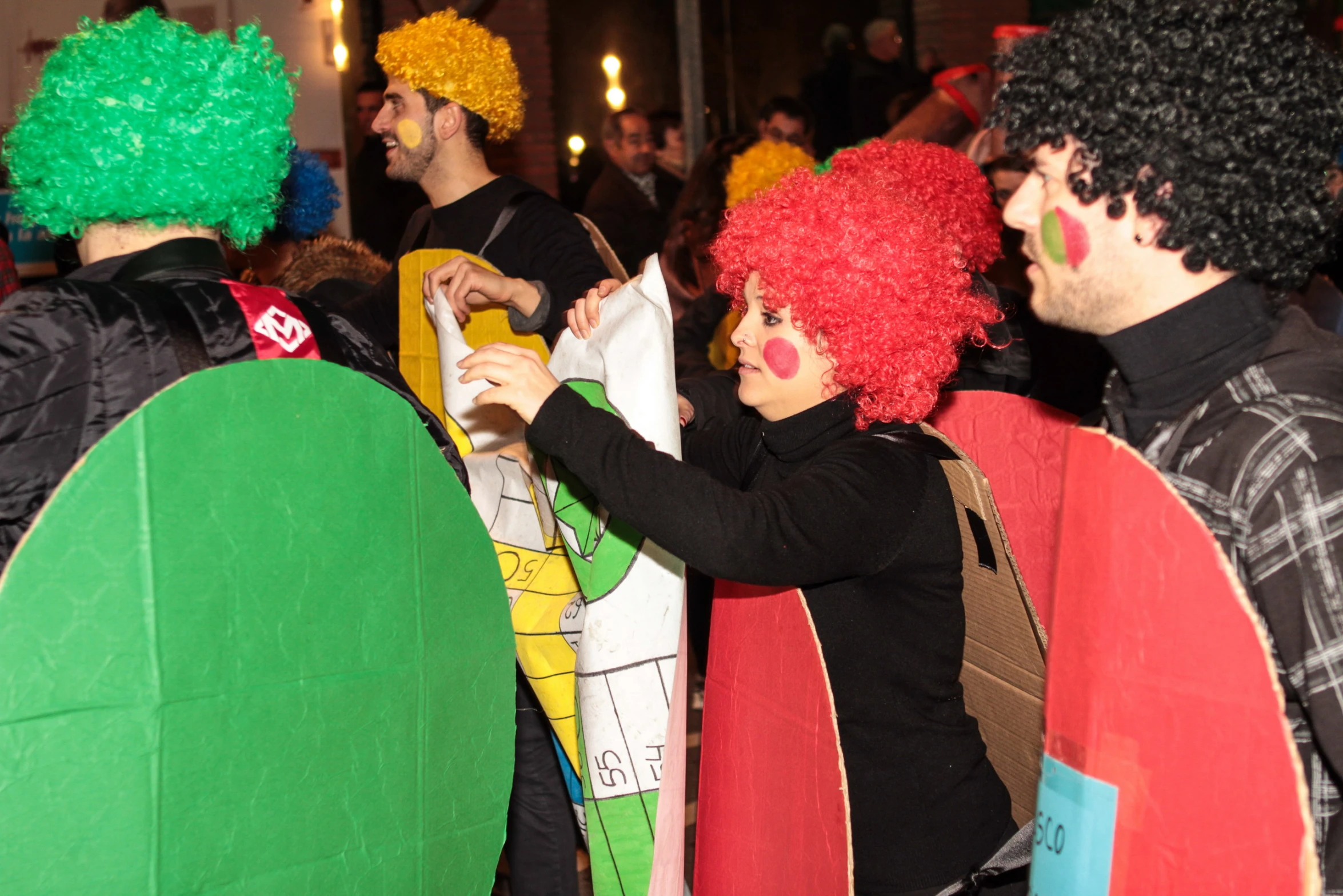 a group of people in costume holding surfboards