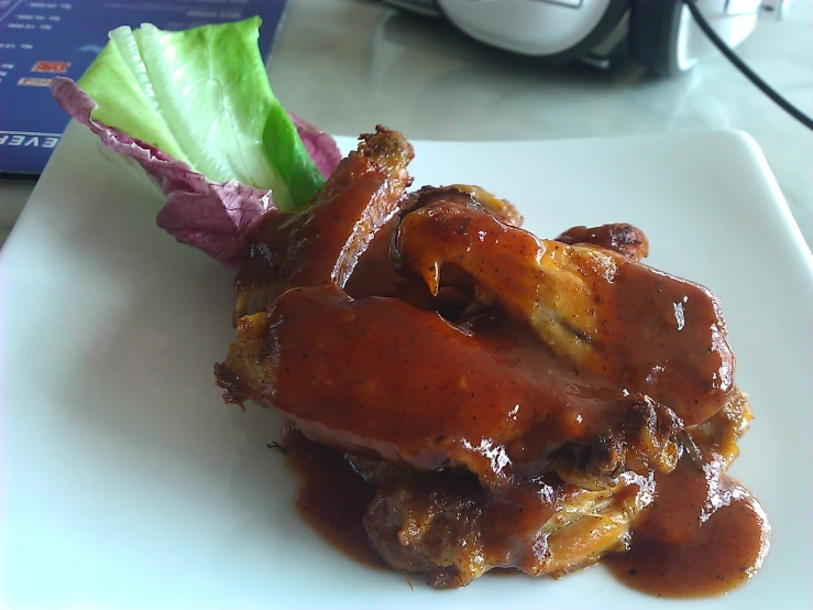 an image of a plate of food that has meat and vegetables