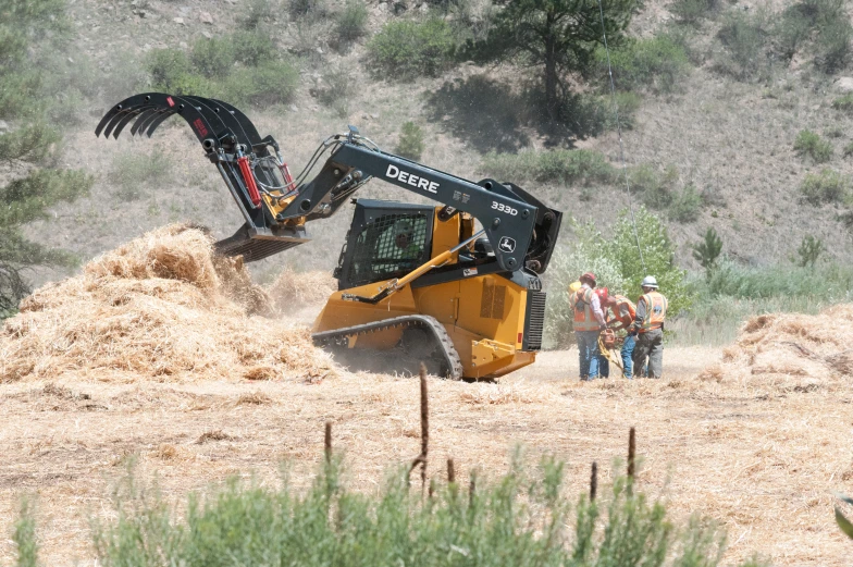 a construction site with a bulldozer digging