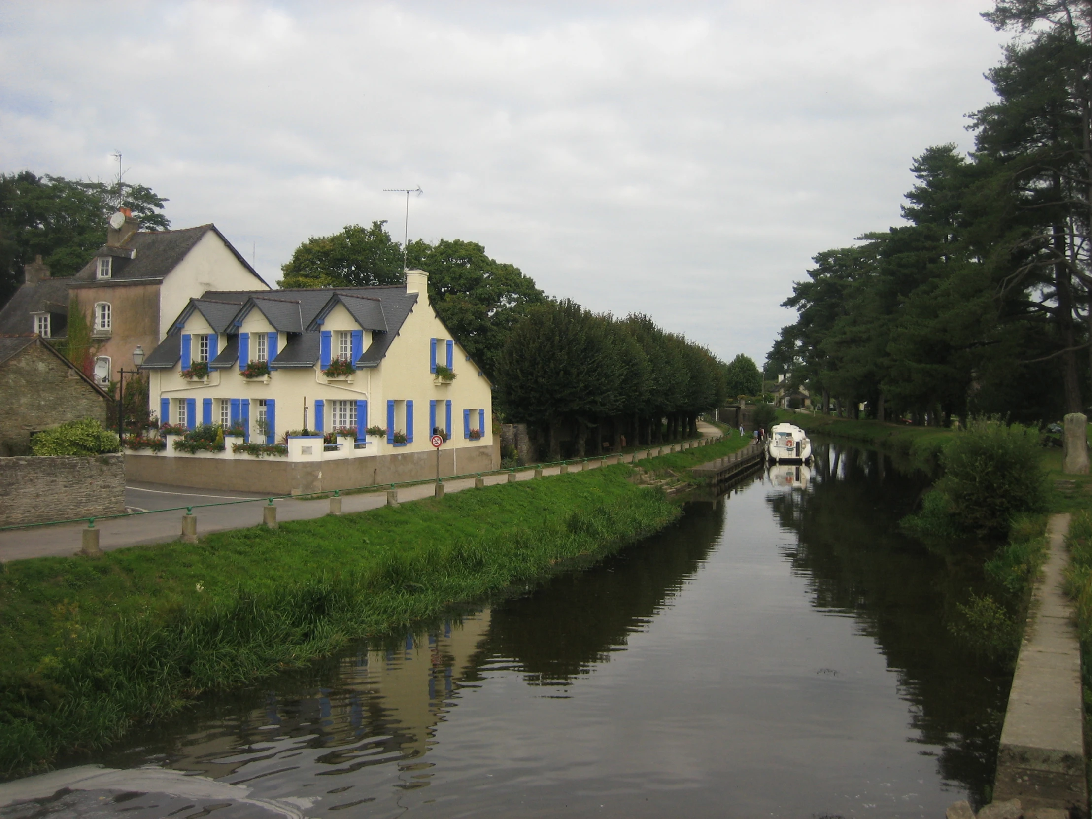 a house along the canal near houses