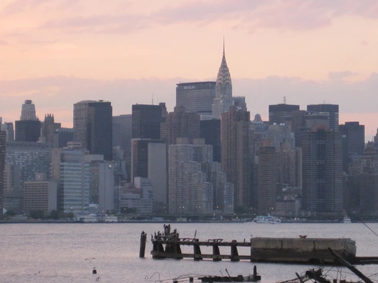 skyline with boats in the water and skyscrs