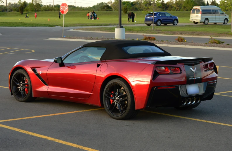 the car is on the parking lot at the park