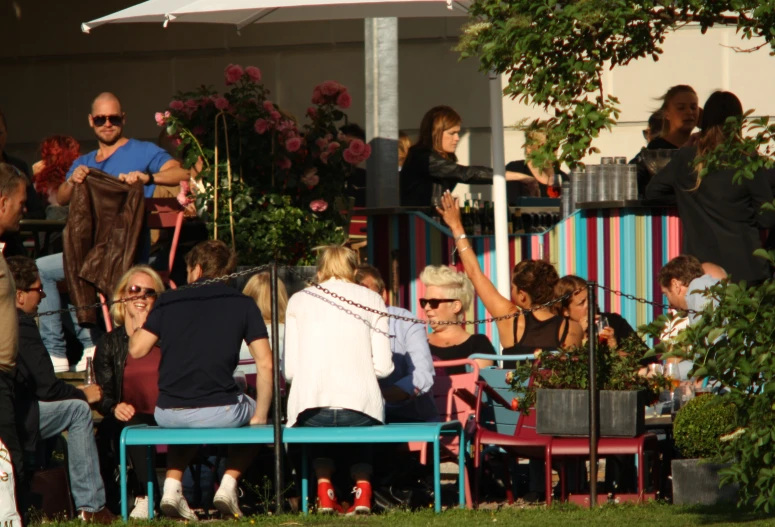 a group of people sitting around each other