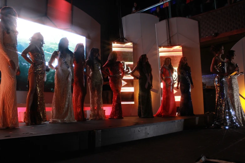 models wearing various styles and colors on stage