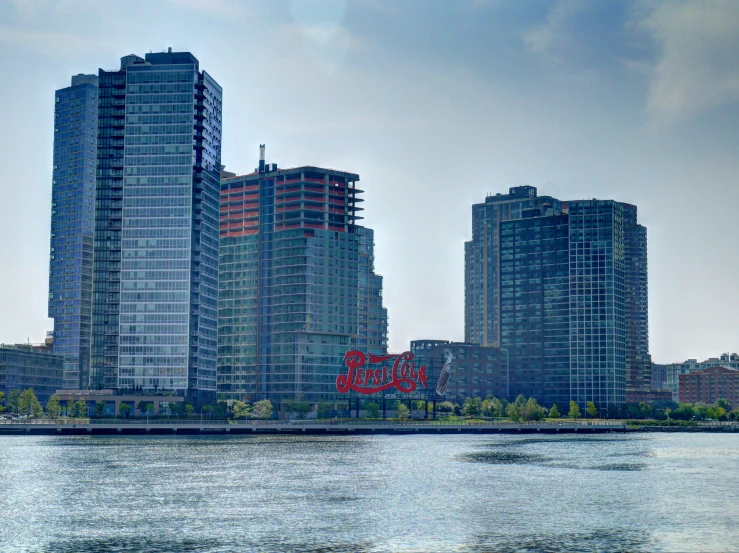 there is a body of water with city buildings on the other side