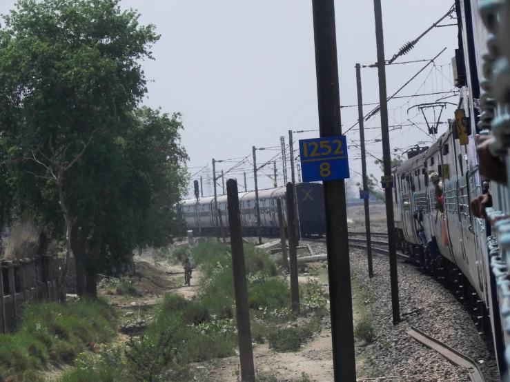 a long train going down the train tracks