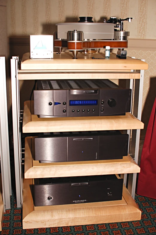 a rack of a few electronics inside a room