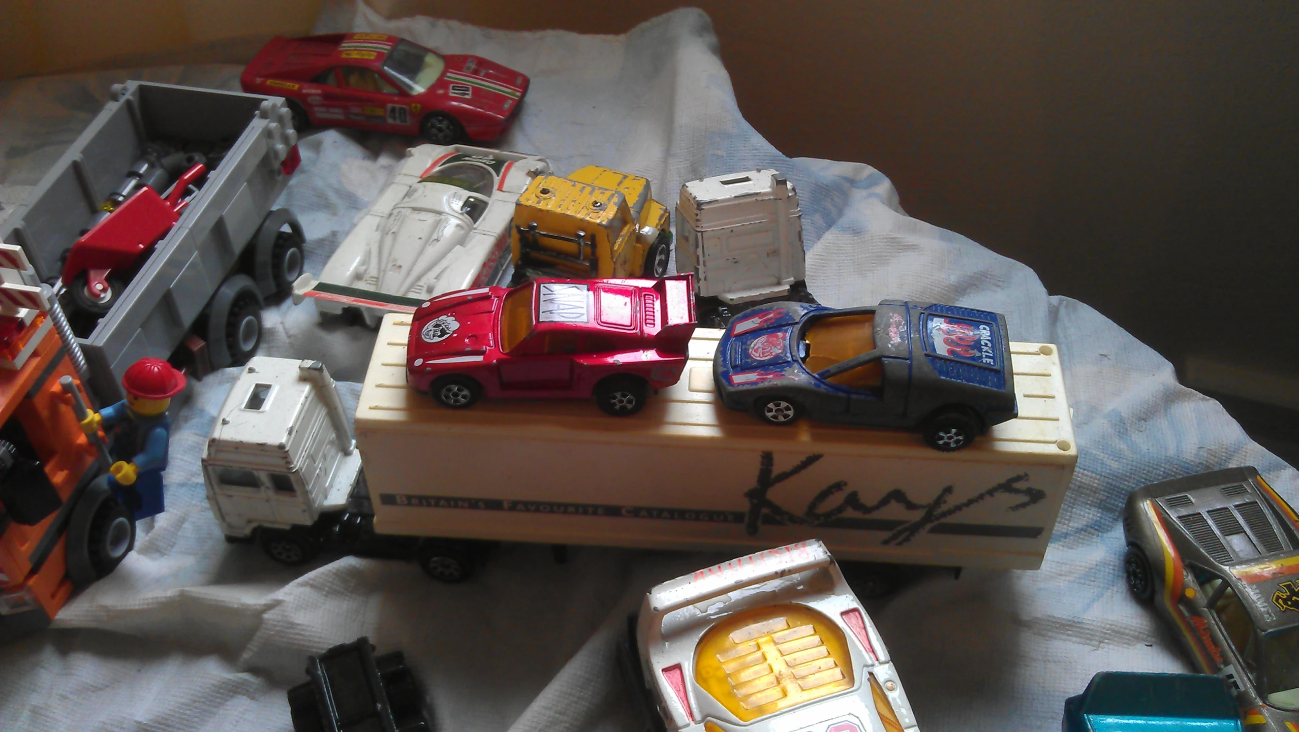 a lot of toy cars in an opened container