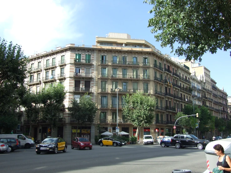 the view of some tall buildings from the street