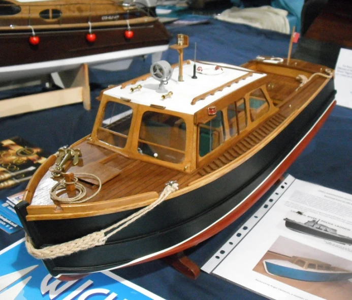 a boat is shown sitting on display on the table