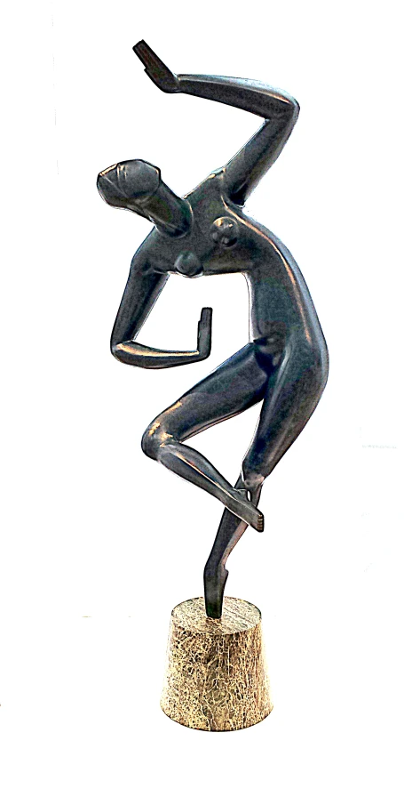 a statue is in the shape of a woman crouching