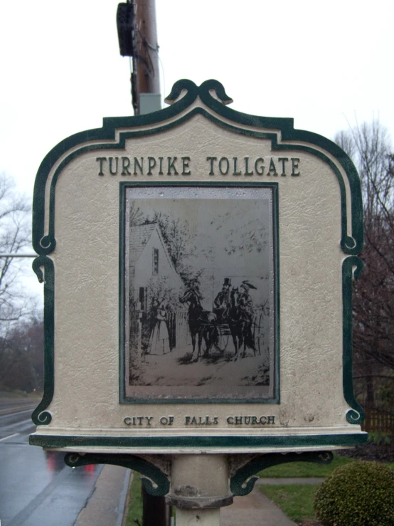 the old sign has been placed over the road for generations