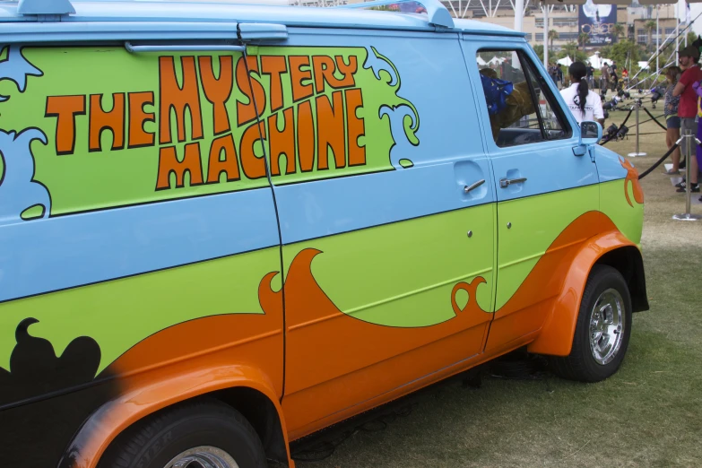 a vehicle that is advertising the mystery machine