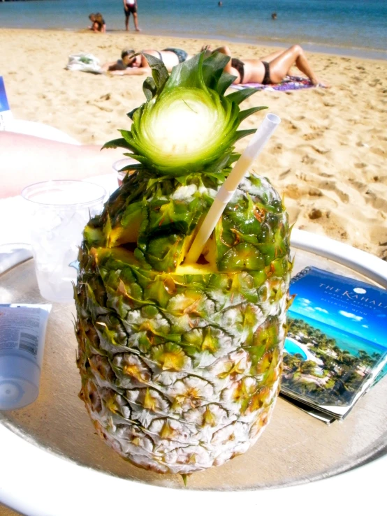 a pineapple fruit sitting on top of a table