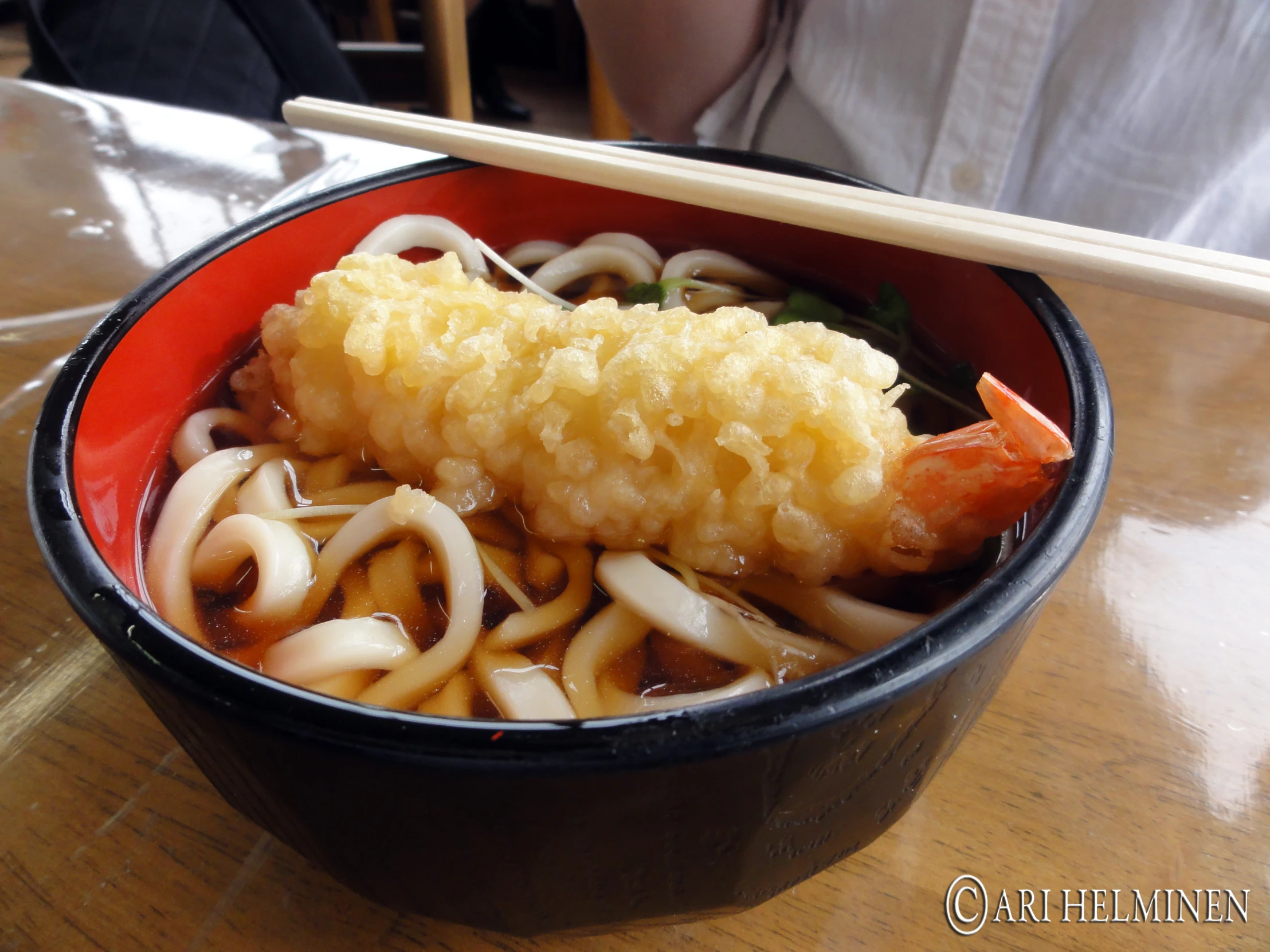 a bowl of food that includes noodles, meat and vegetables