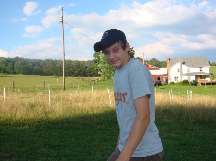 a person wearing a hat in a field