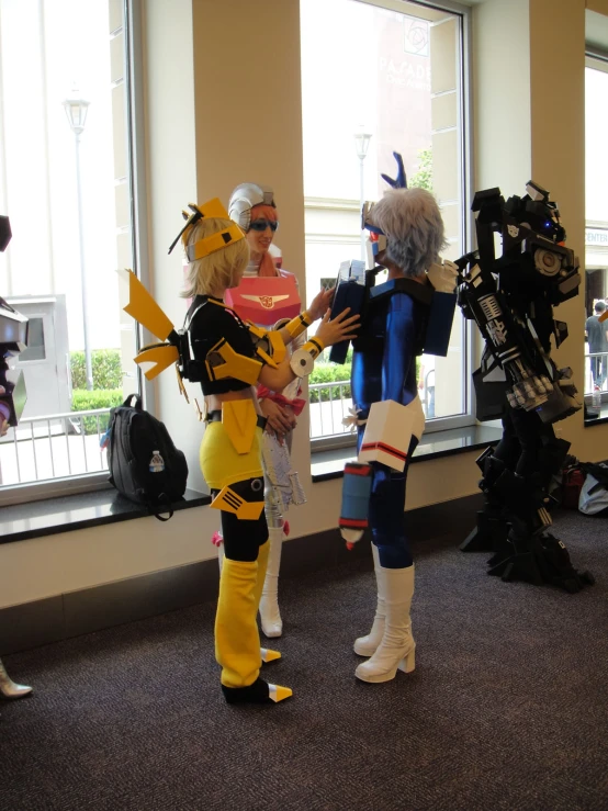 women dressed up as beeman and queen bee cosplay