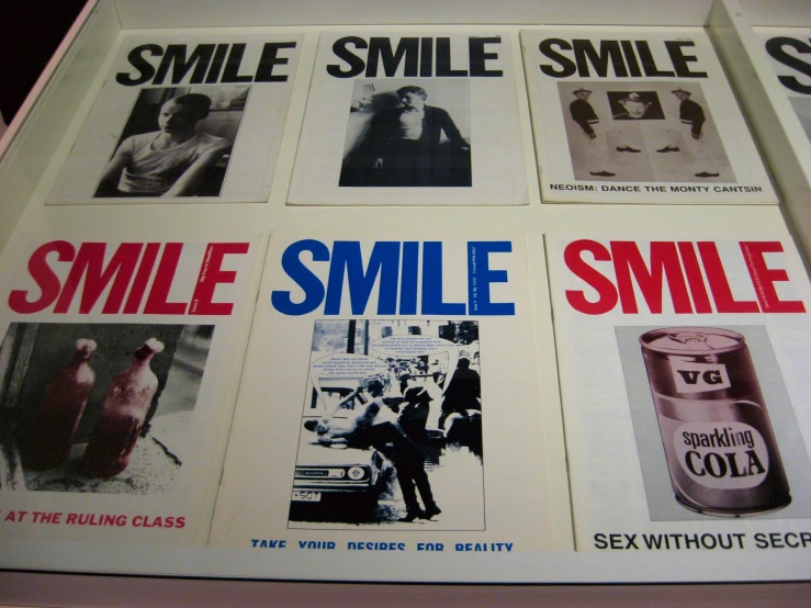 a poster of people smiling and wearing old style clothing