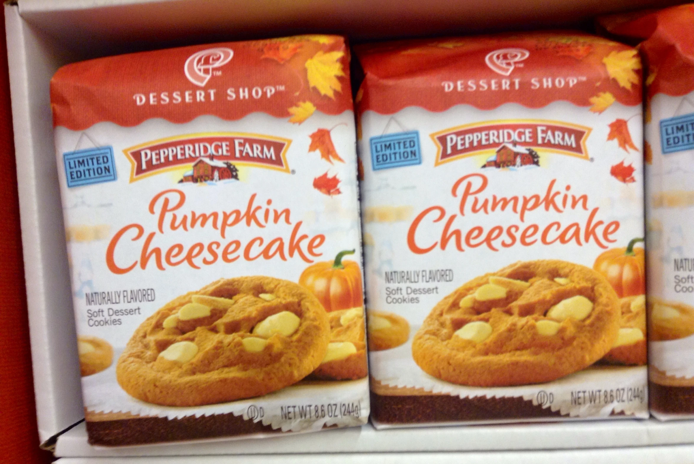 a close up of two packages of pumpkin cheesecake cookies