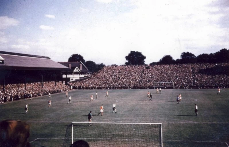 many soccer players play in an open field