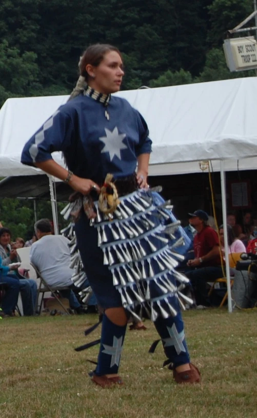 there is a person in costume at a festival