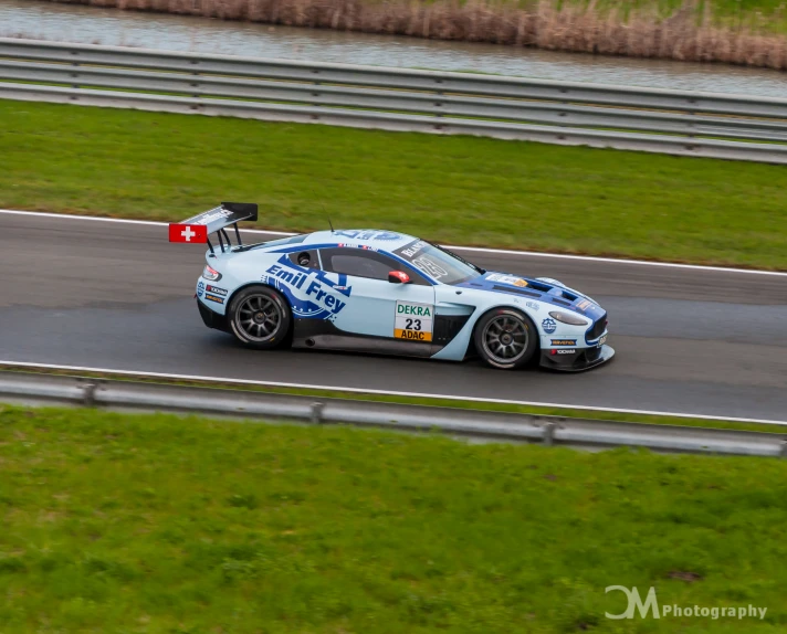 a racing car in the middle of an empty racetrack