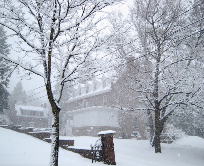 a building with a clock in the snow