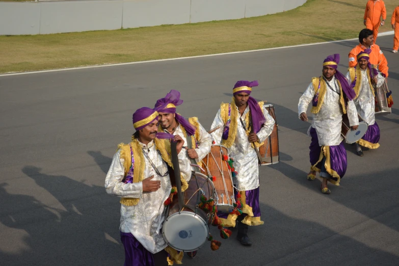 a group of people walking down the street