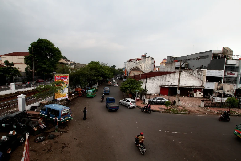 a street scene from an elevated view of vehicles and cars