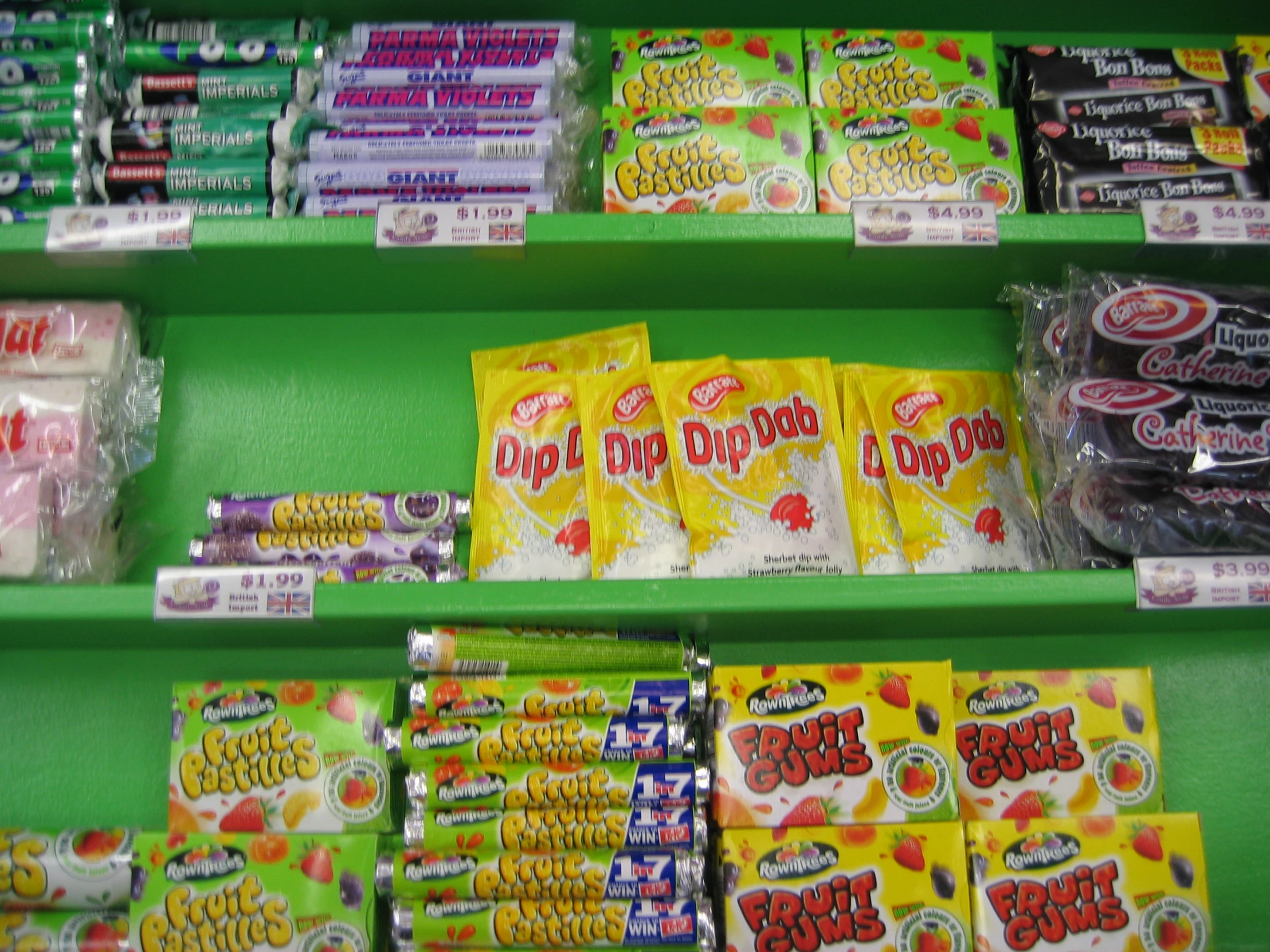 many packets of candy are being sold at a store