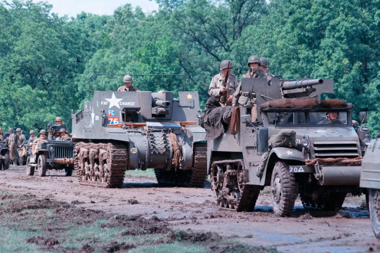 military personnel are lined up outside while in a muddy field
