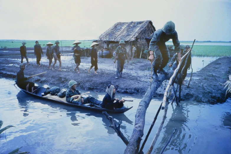 an old picture with people in a canoe and people walking up to it