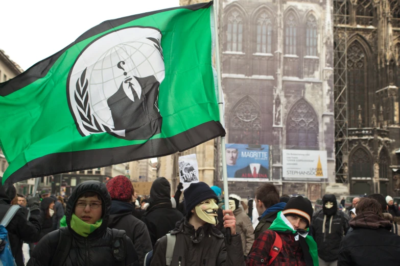 a crowd of people are gathered outside near a building