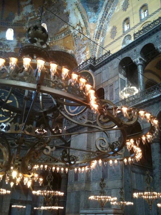 an ornate chandelier hanging in a building