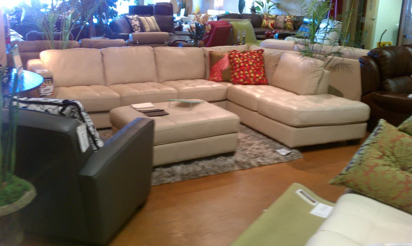 a large sectional couch sitting in a living room