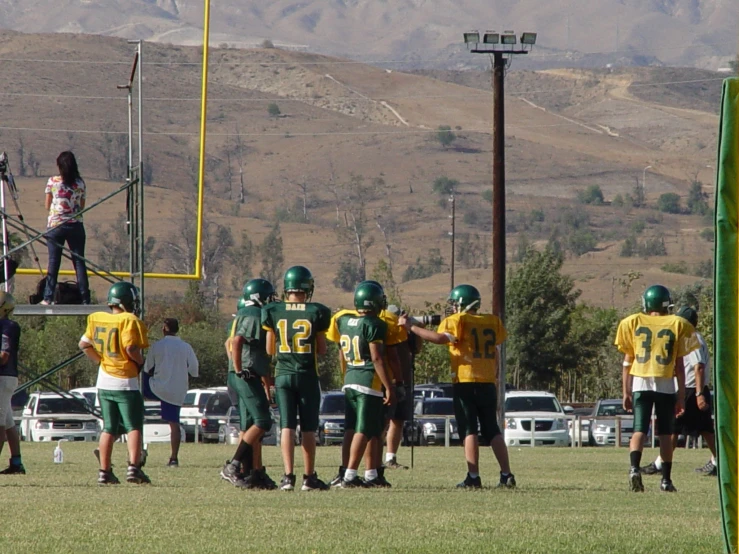 football players standing in line for the game