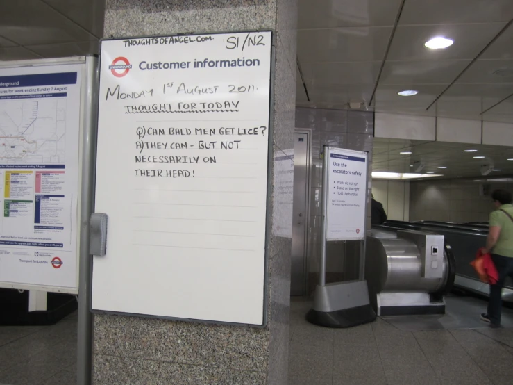 sign with information for subway stations on marble surface