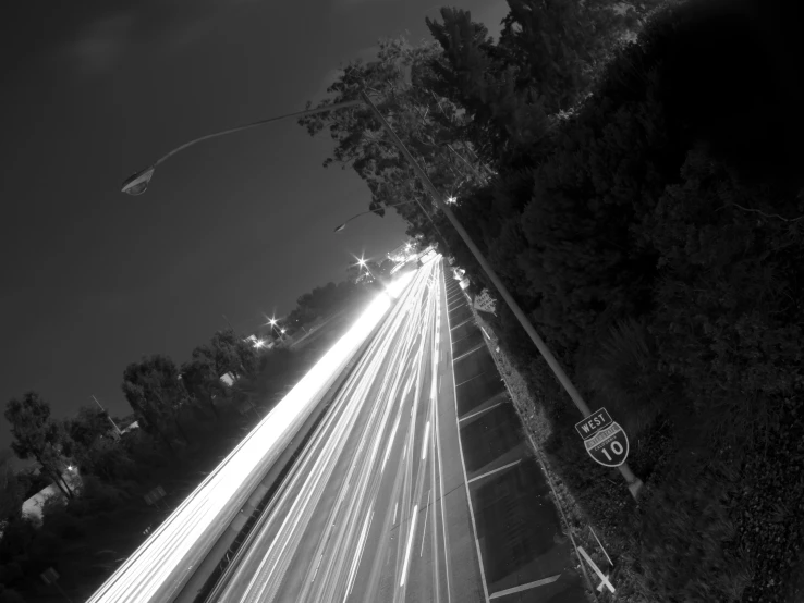 a black and white s of street lights