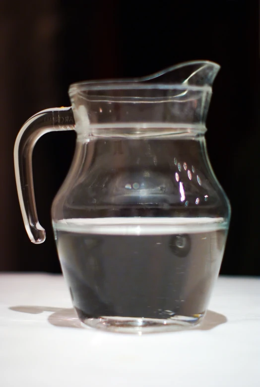 a large jug is sitting on top of a table