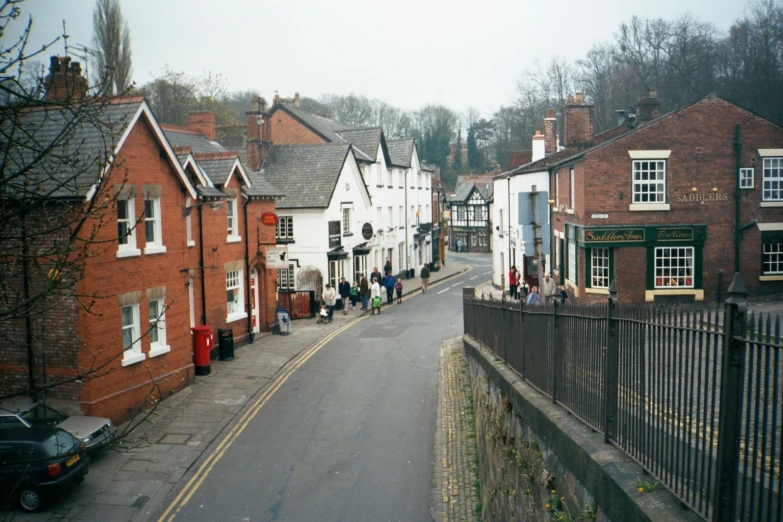 two street side of the same area with lots of houses in it