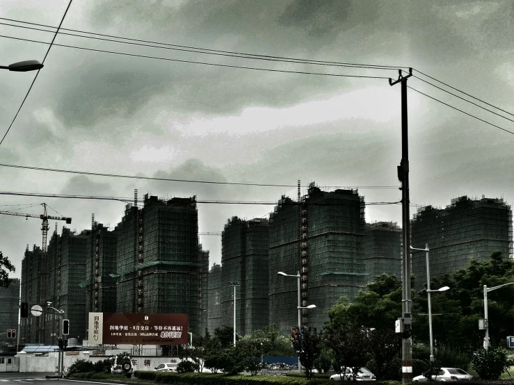 a city filled with tall buildings and clouds