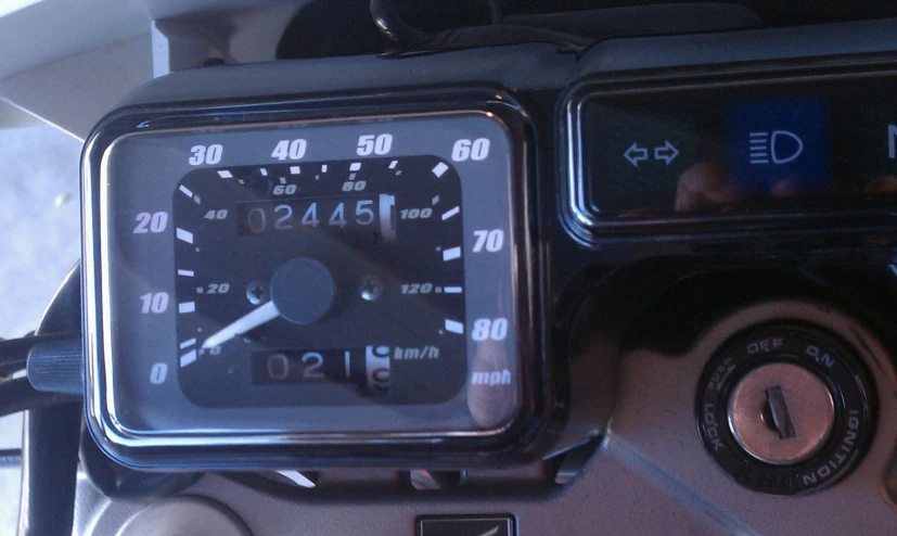 a close up of a meter and dashboard