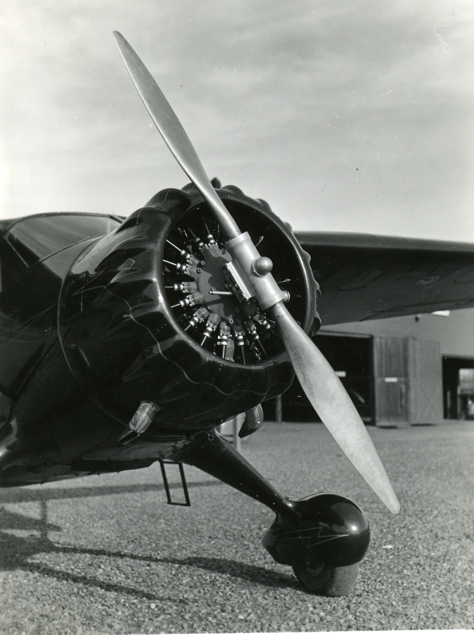 an old picture of a small propeller plane