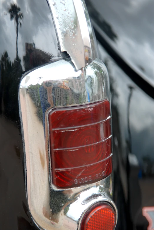 a close up po of the taillights and the back of a car